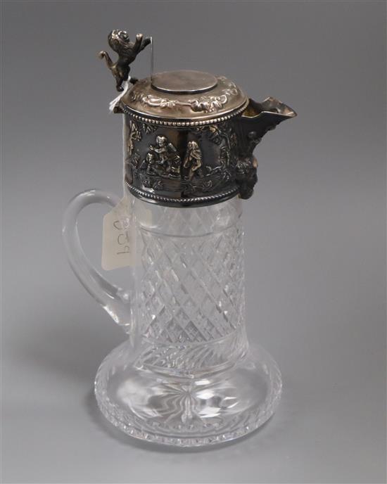 A 925 white metal mounted cut glass claret jug with Bacchanalian decoration, 29.5cm.